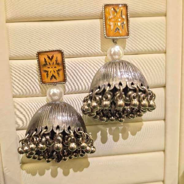 jhumka-style earrings