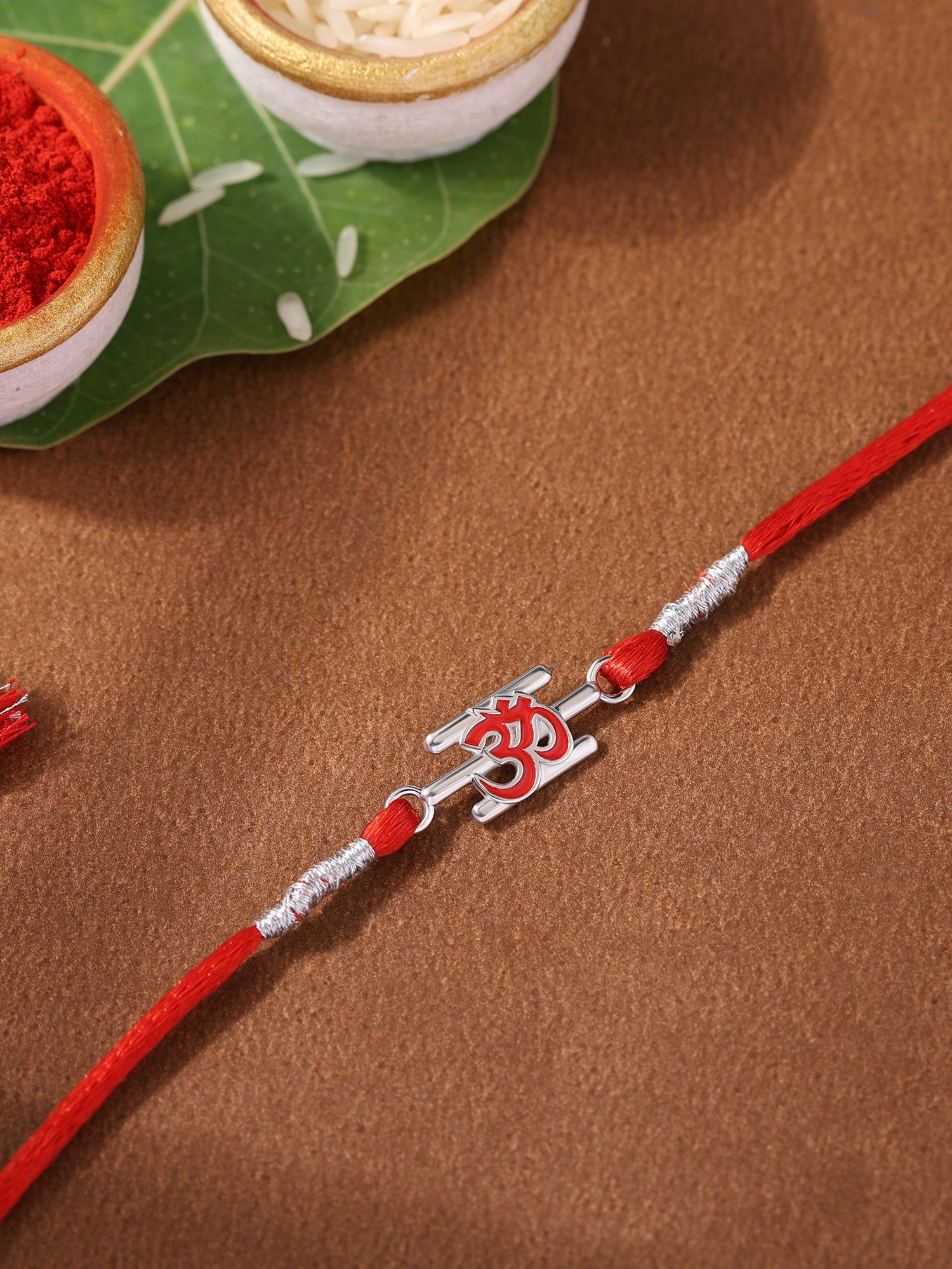 Om Symbol Silver Rakhi