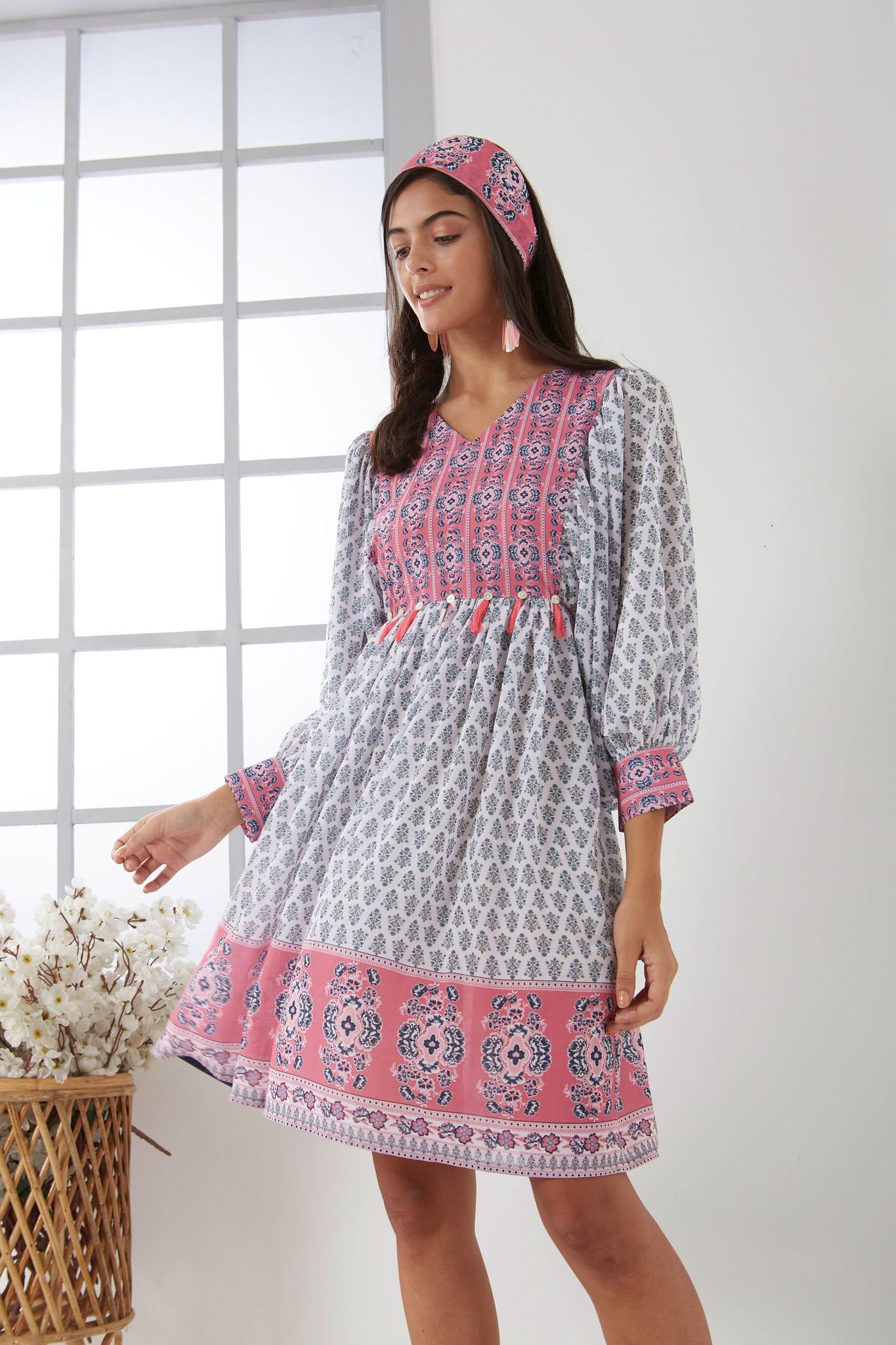 White digital print dress with pink printed yoke having tassel detailing-M
