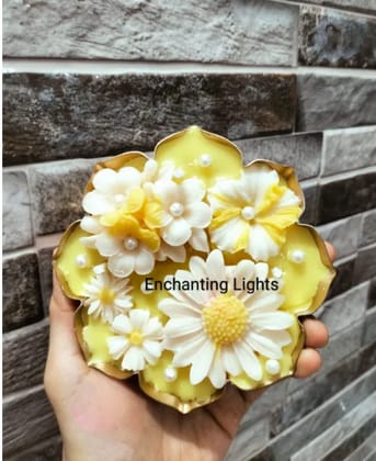 Yellow and white floral urli candle