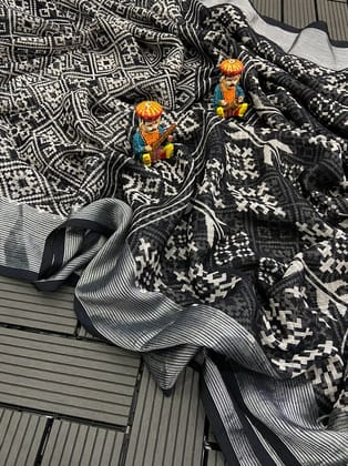 soft chiffon saree with beautiful bandhini print and zari border.