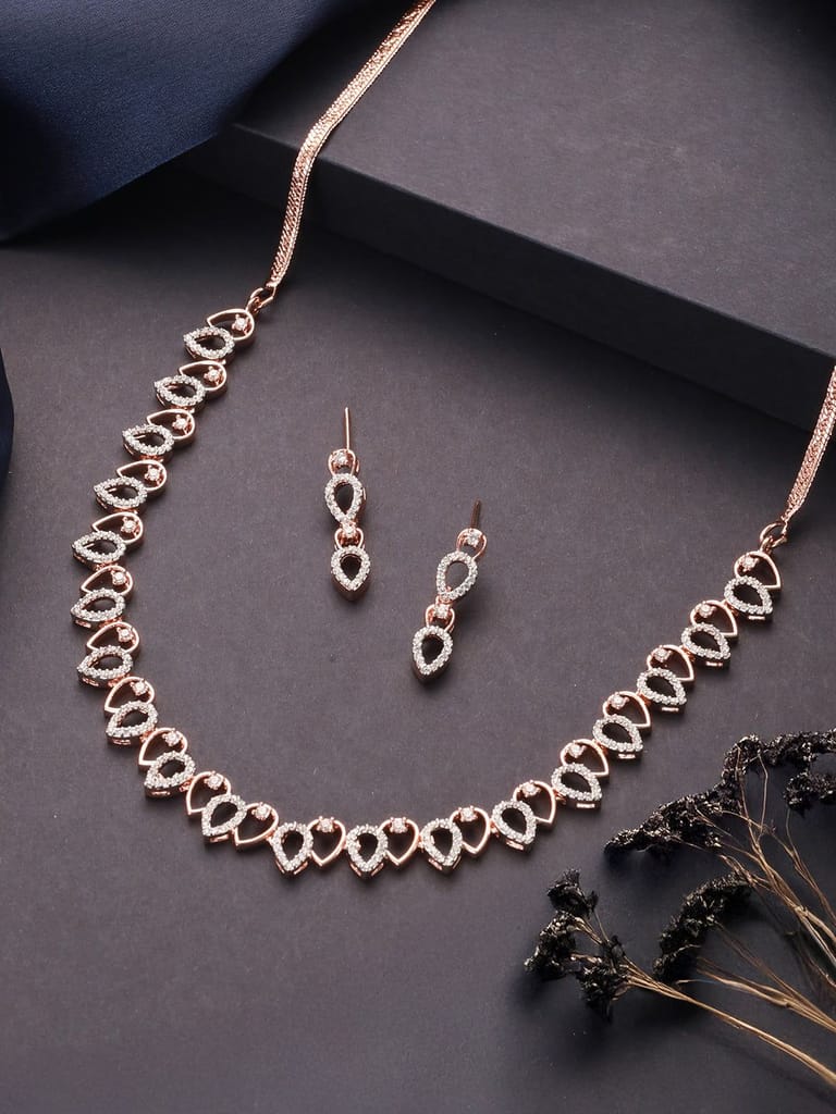 Rose Gold Toned Cubic Zircon Studded Pear Shaped Minimal Jewellery Set - Jewellery Sets | Buy online on ZillyBuy