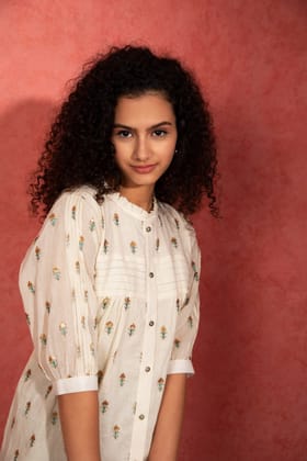 Off-white mul top with sequence and thread work motif-L