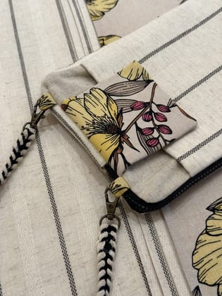 KRI India Bloom Yellow Springs 3-way Sling Bag | Ivory with yellow and pink floral print | 10x6 inches | Wash & Care | 100% Cotton | Handcrafted in India. 100% organic & natural. KRI India Bloom Yellow Springs 3-way Sling Bag | Ivory with yellow and pink floral print | 10x6 inches | Wash & Care | 100% Cotton | Handcrafted in India. 100% organic & natural.