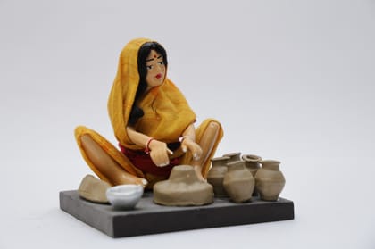 Village Worker (Lady making pottery)