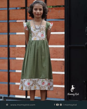 Whispering Grace - Green premium dobby cotton frock with net design in green Whispering Grace - Green premium dobby cotton frock with net design in green