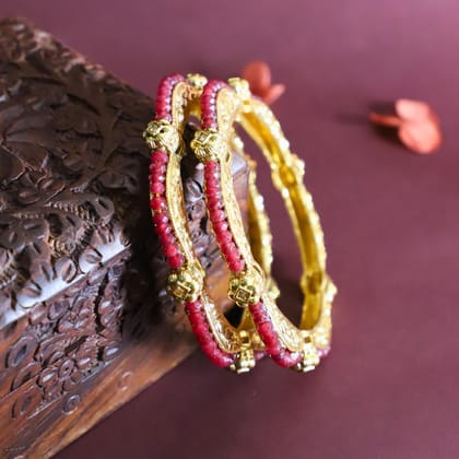 Trendisia Gold-Plated Designer Bangles with Intricate Carvings & Red Beaded Detailing