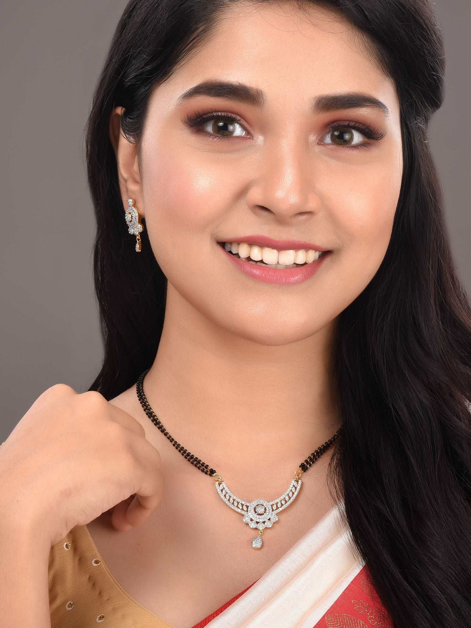 Gold Plated Black & White AD Studded & Beaded Mangalsutra Earrings