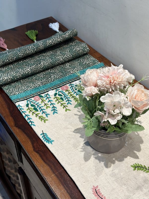 KRI India Bloom Hand embroidered Fringed Table Runner | Beige with green & pink embroidery and printed green sides | 14x80 inches | Wash & Care | 100% Cotton | Handcrafted in India. 100% organic & natural.