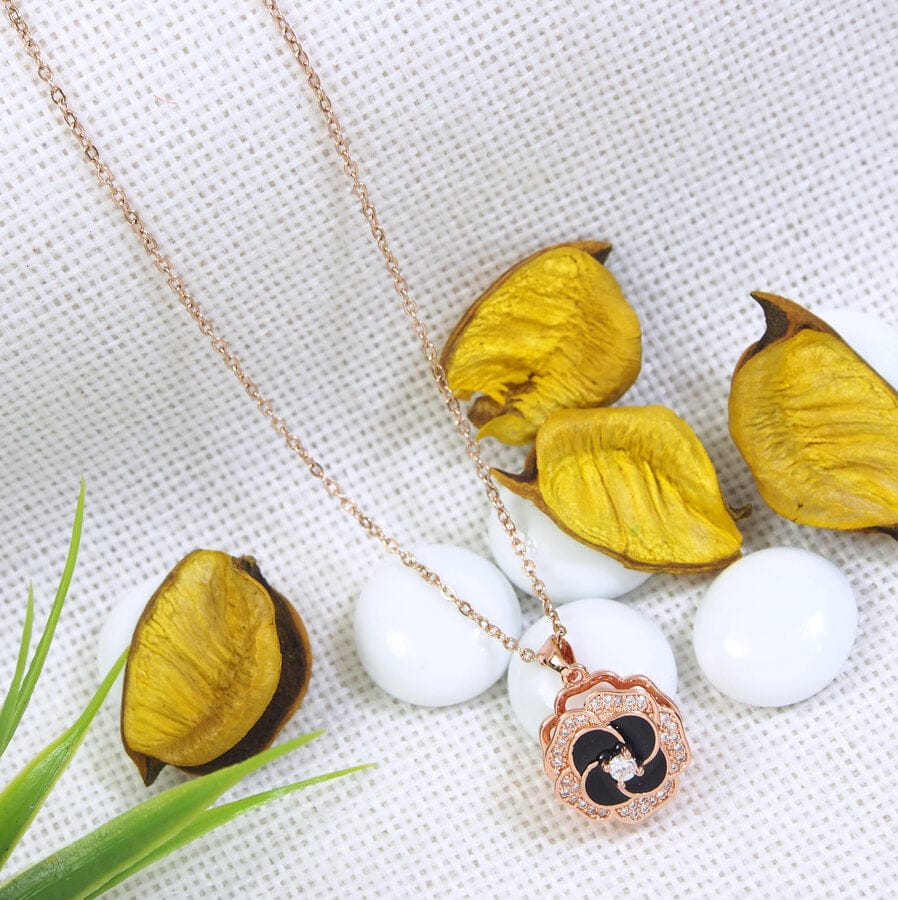 Stainless Steel Gold/Rosegold Plated Floral Spinning Pendent Necklace. SSNK 4304