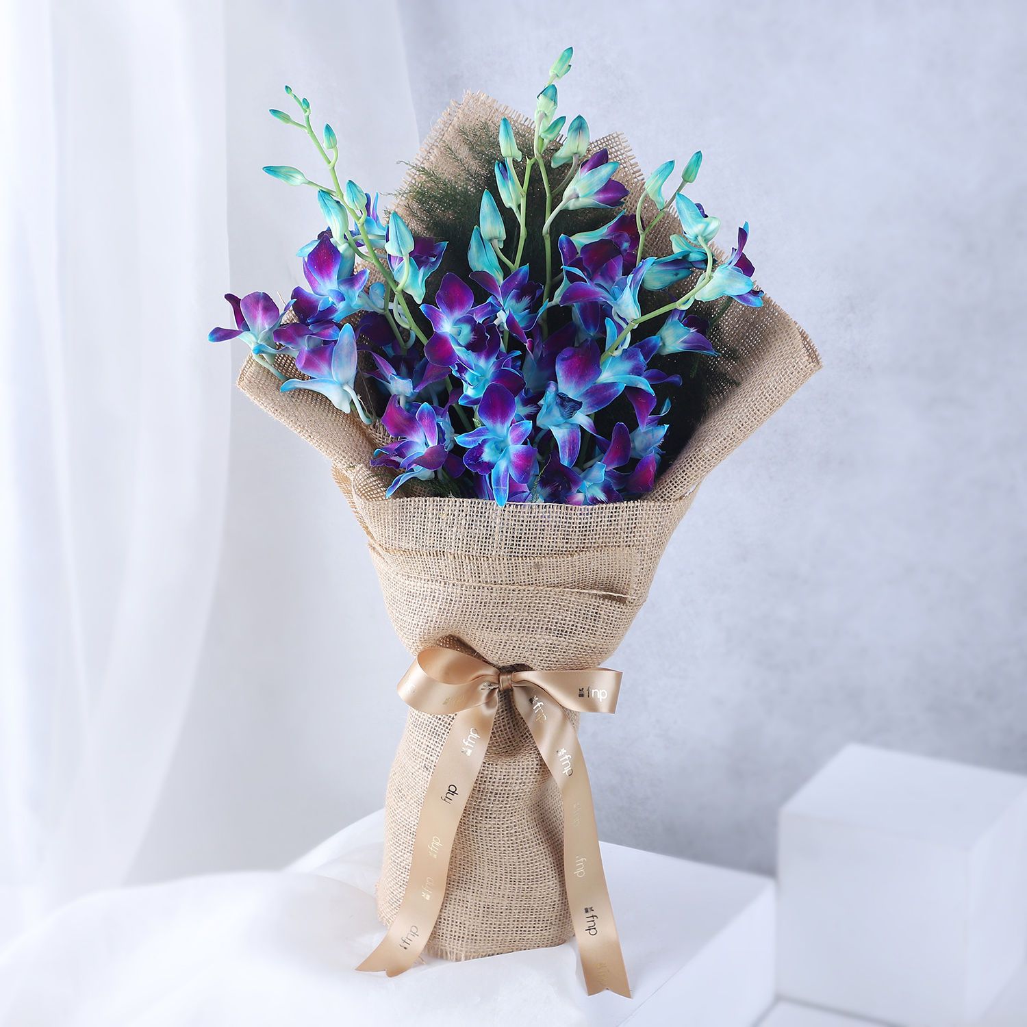 Blue Orchids Beautifully Tied Bunches
