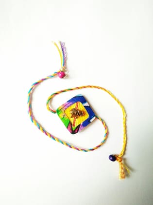 Lemony Diamond Shaped Rakhi Lemony Diamond Shaped Rakhi