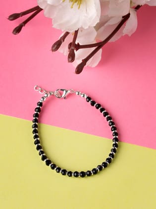 NVR Women Silver Plated Black Beaded Adjustable Rakhi With Roli Chawal-Freesize / Black / Brass