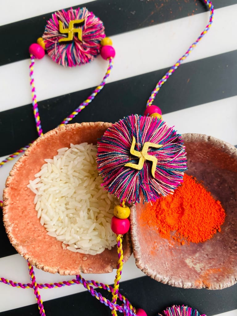 A bouquet of flowers Swastik Rakhi - 1 piece