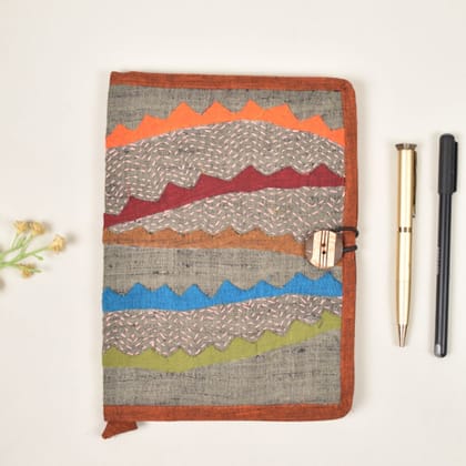 Hand embroidered diary sleeve brown