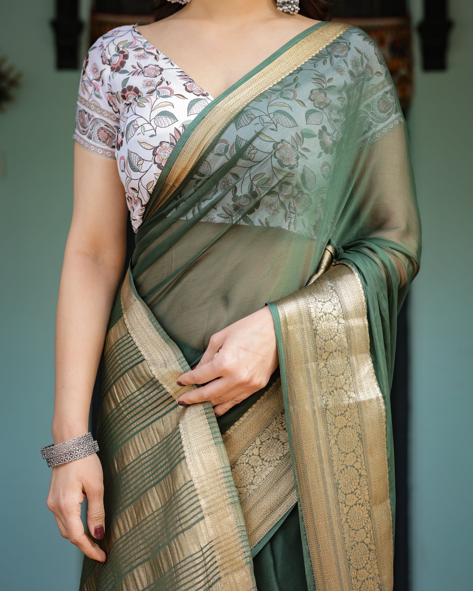 Elegant Bottle Green Plain Chiffon Saree with Gold Zari Border, Floral Printed Blouse & Tassel Finishing-Regular