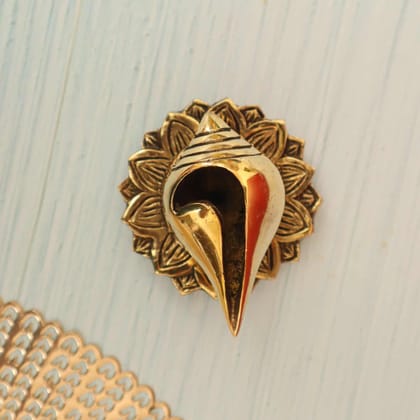 Decorative Brass Shankh / Stylized Conch on Stand In Brass - 4 inch Length Decorative Brass Shankh / Stylized Conch on Stand In Brass - 4 inch Length