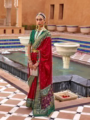 Red Woven Designed Patola Silk Saree