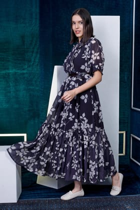 Black maxi dress with pleating and ruffle teamed with a belt-M