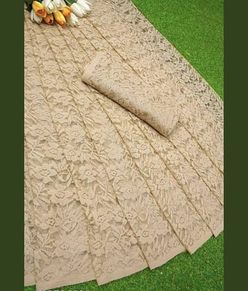 Saadhvi Net Self Design Saree With Unstitched Blouse Piece ( Beige )