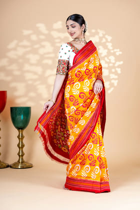 Orange Pochampally Silk Saree With Beautiful Ikaat Detailing And Red Border