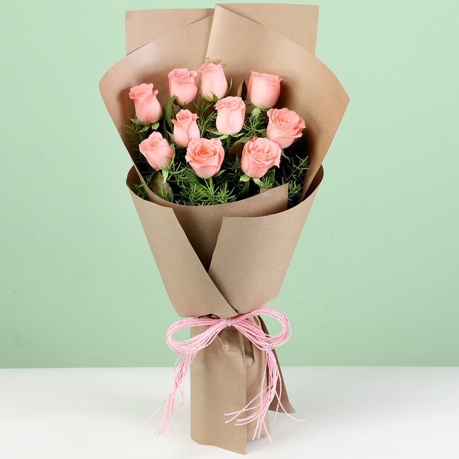 10 Pink Roses In Brown Paper