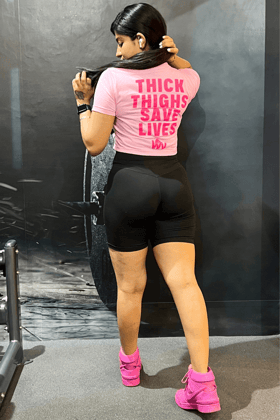 THICK THIGHS SAVE LIVES (CROPPED) TEE IN BABY PINK-XS