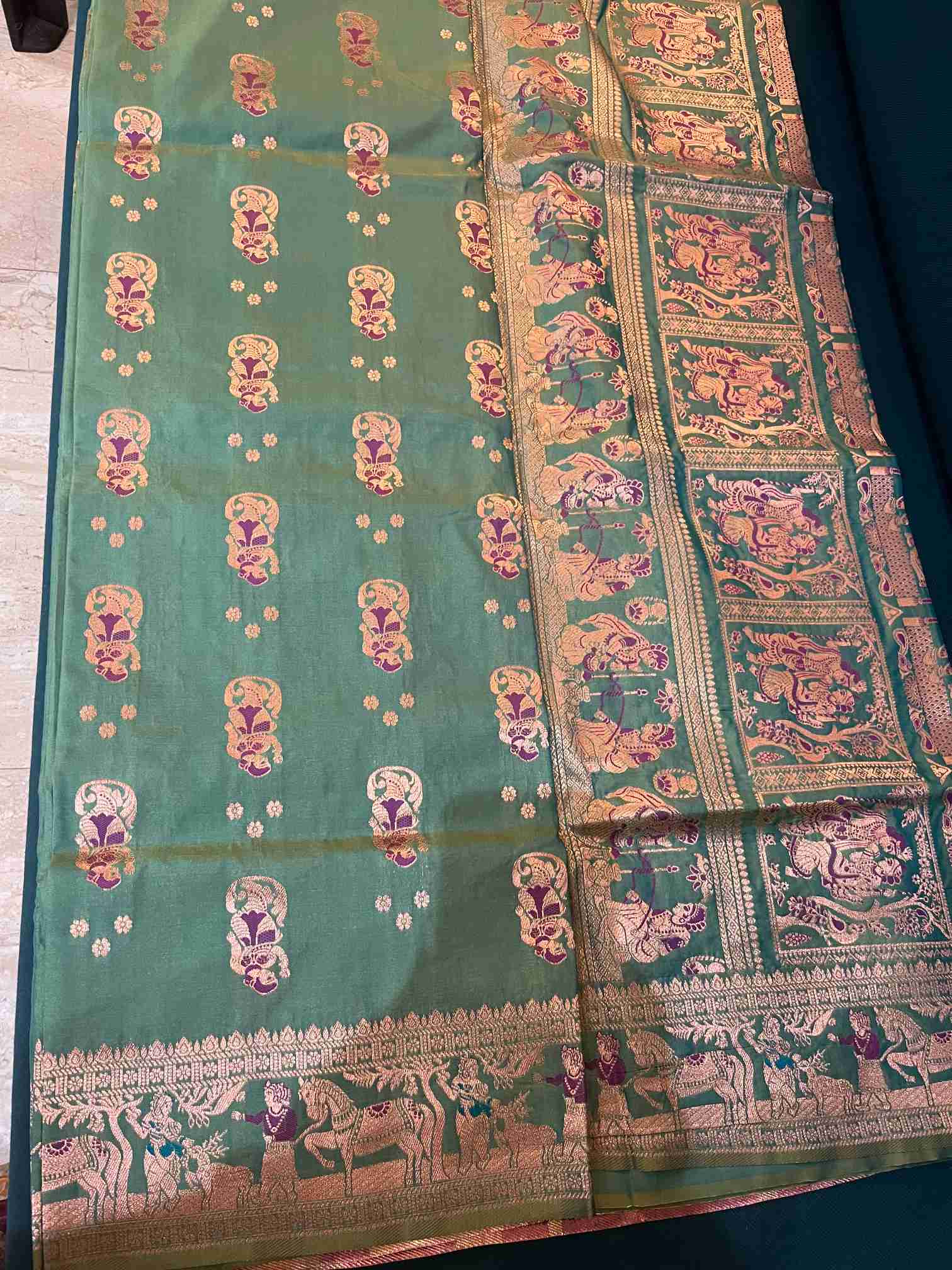 Sea Green Swarnachari Silk Saree with Purple Zari Mythological Motifs