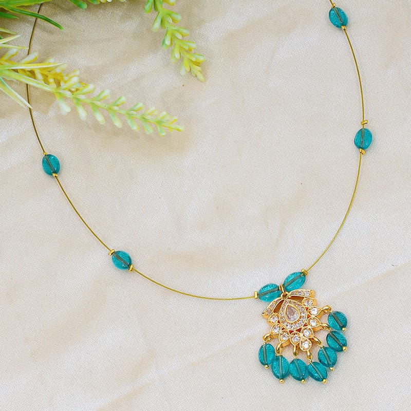 Elegant Teal Gemstone Invisible Necklace with Gold-Toned Floral Pendant