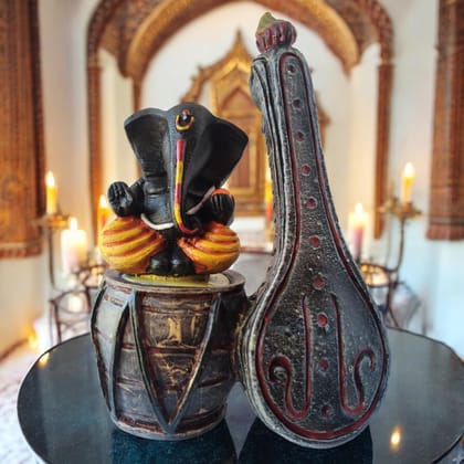 AMS Lord Ganesh Idol with Dholak and Veena Decorative Ganapati Murti for Home Decor, Office Desk, Prayer Room, Housewarming Gift Black and Gold Ganesha Figurine for Living Room, Spiritual Showpiece