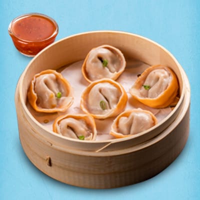 Schezwan Paneer Momo With Momo Chutney (Choose Steamed/ Fried)