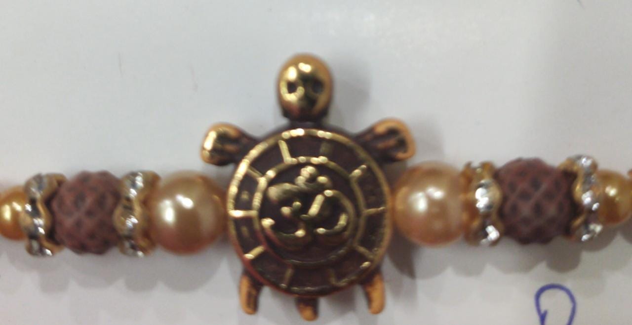 Designer Rakhi and Roli Chawal Pack