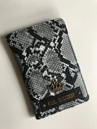 Snake Print Passport Cover With Customized Name And Charm Options.