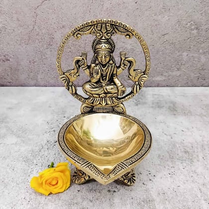 Brass Gaja Lakshmi Diya - 6 inch Height | Brass Diya with Gaja Lakshmi Design Brass Gaja Lakshmi Diya - 6 inch Height | Brass Diya with Gaja Lakshmi Design