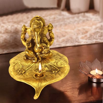 DreamKraft Metal Leaf Ganesh with Diya For Home Decor, Gift and Puja Idol