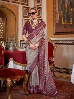 Beige cream Soft Silk Woven Printed Patola Designed Saree
