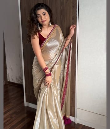 Sidhidata Tissue Solid Saree With Unstitched Blouse Piece ( Purple )