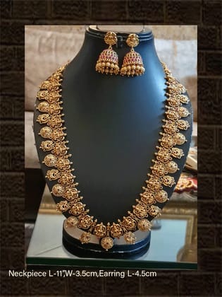Long gold plated ruby and green stones set with laxmiji motif tukdies and circular tukdies