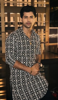 Siddharth Nigam in Men's Cotton Embroidered Gold sequinned Black Kurta-36