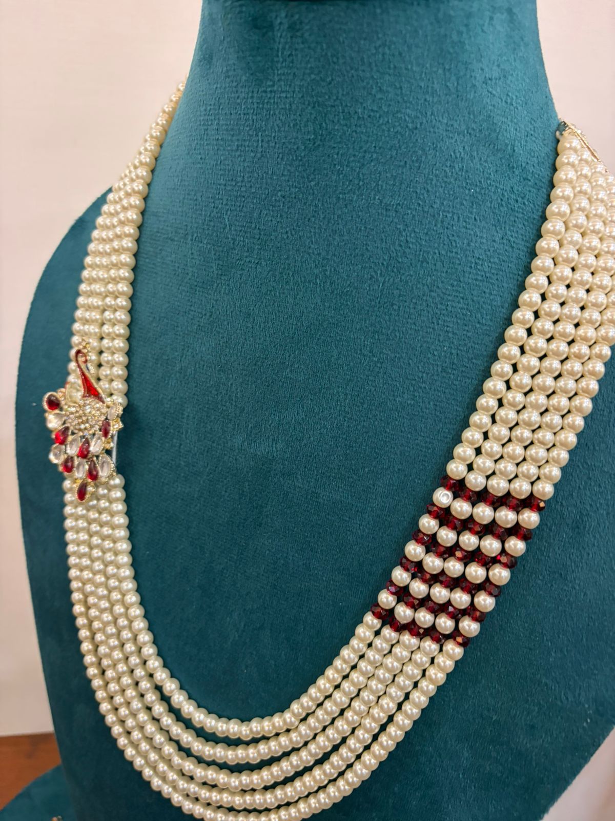 fancy design peacock pearl mala with red beads for groom and party wear