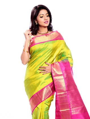 Saree for Indian Wedding in Green + Elegant Pink Border