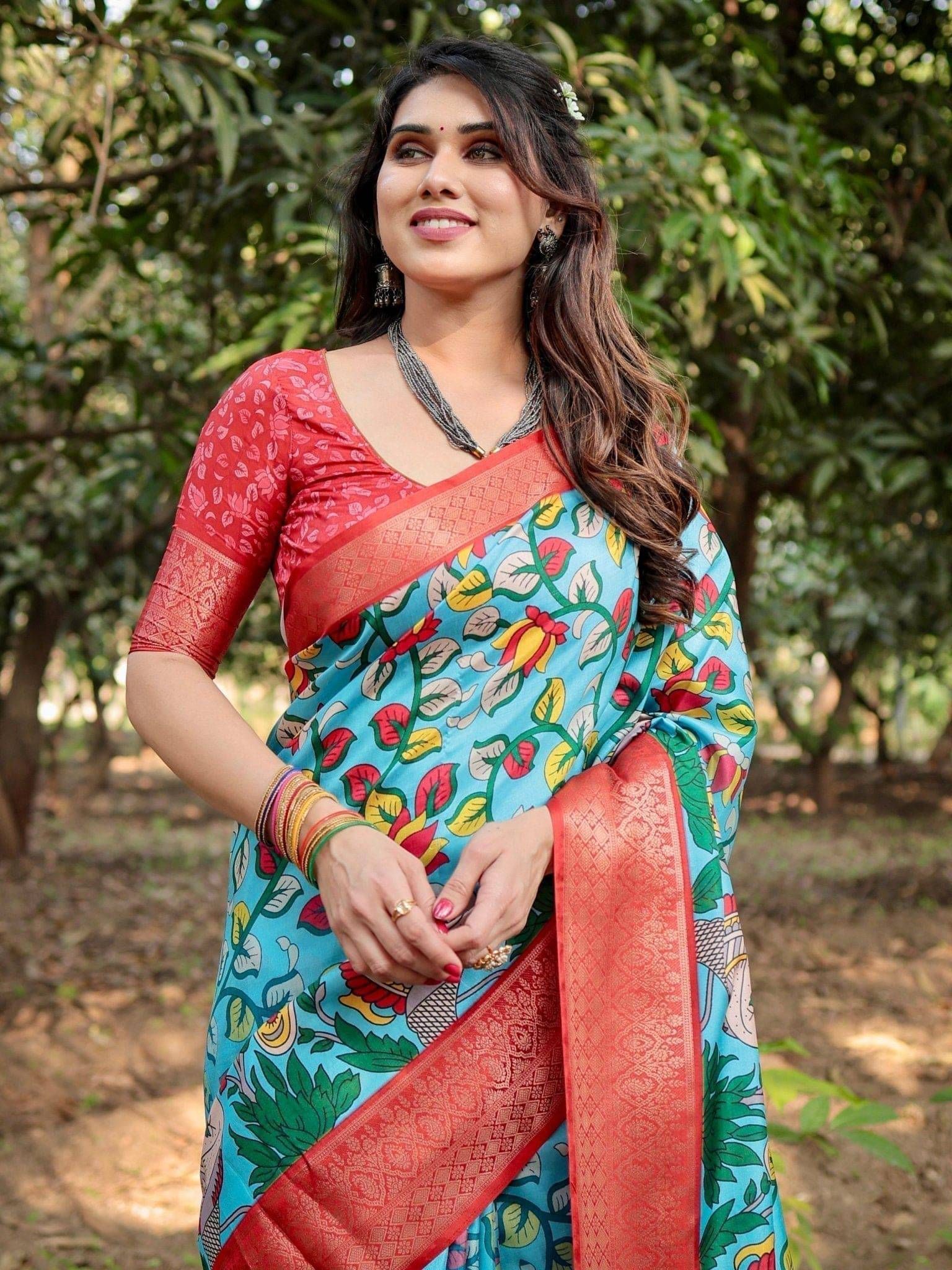 Aqua Blue Tussar Silk Saree with Vibrant Nature-Inspired Prints and Red Zari Border-Regular