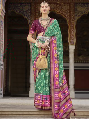Green  Soft Silk Woven Printed Patola Designed Saree