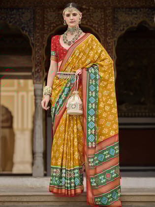 Mustard yellow  Soft Silk Woven Printed Patola Designed Saree